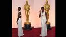 Lupita Nyong'o terlihat seksi dengan gaun potongan halter neck di Academy Awards 2015 yang digelar di Dolby Theatre, Hollywood, California, AS, Minggu (22/2) malam. (AFP PHOTO/ Mark RALSTON)
