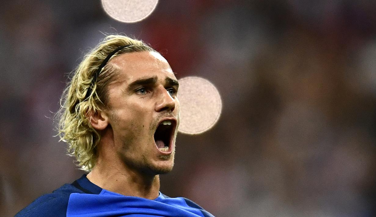 Antoine Griezmann saat merayakan gol pada pertandingan kualifikasi Piala Dunia FIFA 2018 antara Prancis vs Belanda di Stade de France di Saint-Denis, Paris, Agustus 2017. (Photo by Christophe Simon / AFP)
