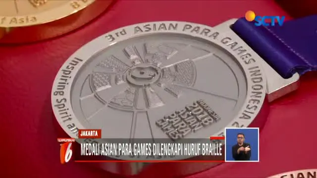 Di bagian belakang, ada logo Asian Paralympic Commitee serta kumpulan titik di bagian bawah.