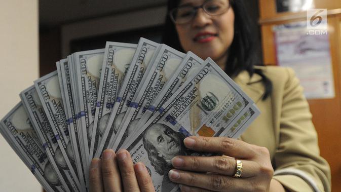 Dolar AS Menguat, Money Changer Kebanjiran Transaksi