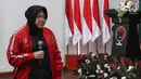 Wali Kota Surabaya Tri Rismaharini menghadiri acara pelantikan dirinya sebagai Ketua DPP PDIP bidang Kebudayaan di Kantor DPP PDIP, Jakarta, Senin (19/8/2019). Risma resmi menjabat sebagai Ketua Bidang Kebudayaan DPP PDI Perjuangan masa bakti 2019-2024. (Liputan6.com/Johan Tallo)