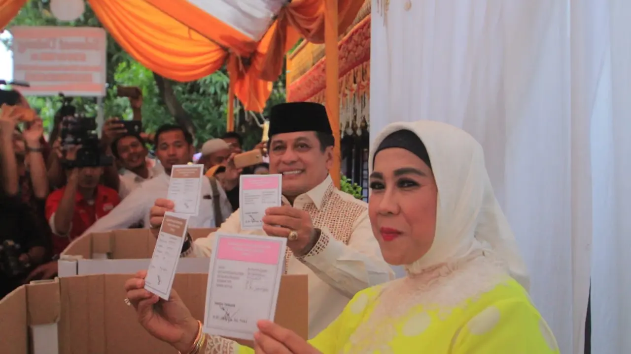 Nurdin Halid saat mencoblos Pilkada 2018 (Liputan6.com/Fauzan)