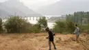 Diketahui, Spanyol menghadapi kebakaran hutan bersejarah di lebih dari 51 lokasi di seluruh wilayah. (CESAR MANSO/AFP)