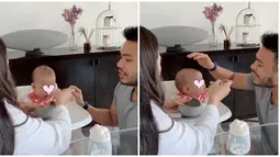 Ini adalah tangkapan layar video singkat ketika Mila menyuapi Kyarra, sementara Yakup menghibur Kyarra agar mau makan. Kyarra sesekali melihat sang ayah dan mengukuti gerakan mulutnya. Yakup Hasibuan pun memuji sang putri ketika berhasil suap makanannya. Penuh kehangatan, tak sedikit yang memuji keluarga kecil Mila dan Yakup Hasibuan di momen ini. (Liputan6.com/IG/jscmila)