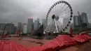 Badai ini diperkirakan akan membawa angin berkecepatan lebih dari 167 kilometer (103 mil) per jam, membawa hujan lebat dan angin kencang di seluruh wilayah. (Peter PARKS/AFP)