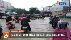 Para pengendara menunggu air surut hingga berjam-jam agar bisa melintas jalanan yang tergenang air.