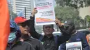 Para buruh mendesak pemerintah mencabut Permendag No 8/2024 tentang Kebijakan dan Pengaturan Impor. (merdeka.com/Imam Buhori)