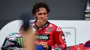 Ekspresi pembalap Italia dari Ducati Lenovo Team, Enea Bastianini setelah berhasil memenangkan balapan sprint MotoGP Grand Prix Inggris di Sirkuit Silverstone, Northamptonshire, Inggris, pada 3 Agustus 2024. (BENJAMIN CREMEL/AFP)