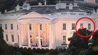Cahaya merah misterius dari Gedung Putih yang ditempati Presiden AS Donald Trump. (Twitter)