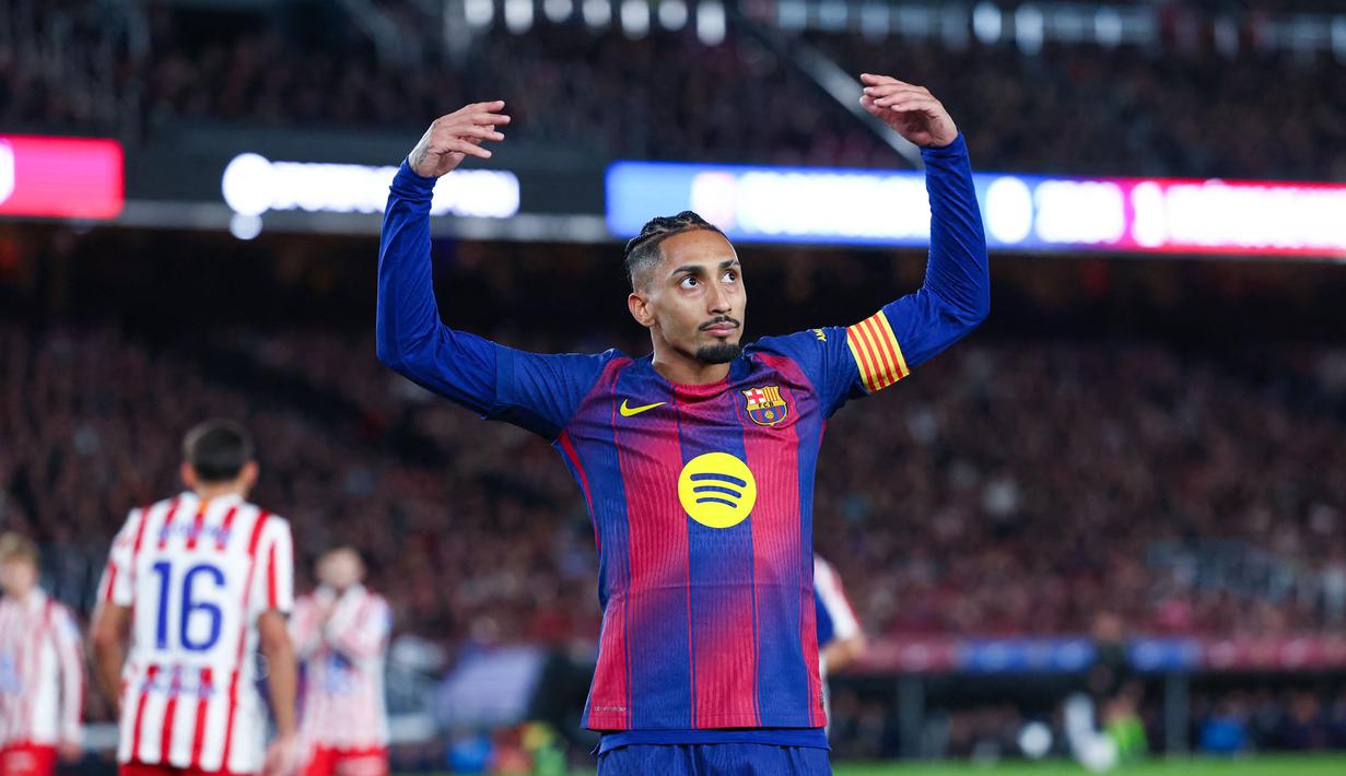 Tambahan tiga angka ini membuat tim besutan Hansi Flick bertengger kukuh di posisi puncak klasemen sementara dengan 37 poin dari 15 pertandingan. (AFP/Josep Lago)