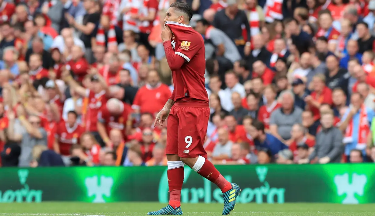 Gol Roberto Firmino pada menit ke-17 membuka keran gol Liverpool atas Arsenal pada lanjutan Liga Inggris di Anfield, Liverpool, Inggris (27/8). Liverpool menang atas Arsenal dengan skor 4-0. (Peter Byrne/PA via AP)