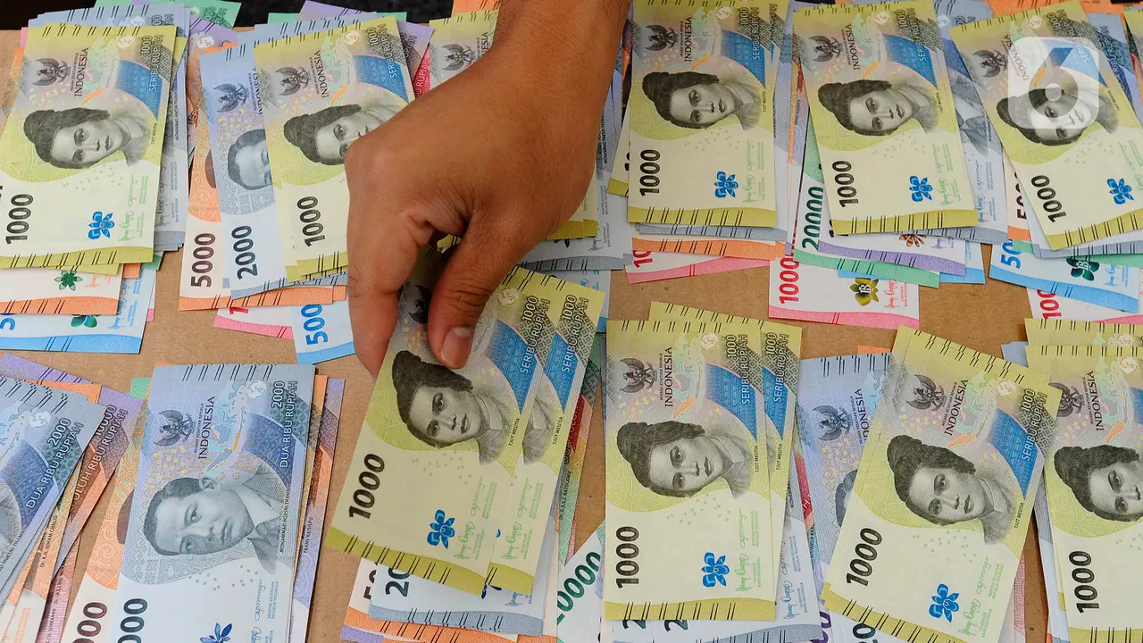 Antusiasme Warga Tukar Uang Rupiah Tahun Emisi 2022