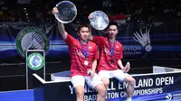 Ganda putra Indonesia, Kevin Sanjaya/Marcus Gideon, merebut gelar All England 2017 setelah mengalahkan pasangan China, Li Junhui/Liu Yuchen. Pada partai final, Minggu (12/3/2017), Kevin/Marcus menang dua gim 21-19 dan 21-14. (AFP/Justin Tallis)