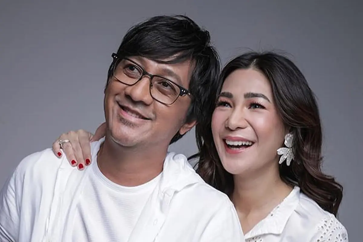 Andre Taulany bersama Istrinya, Rien Wartia Trigina