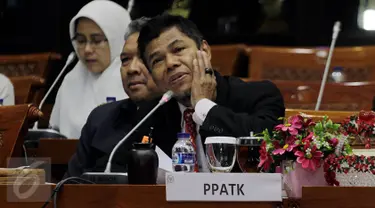  Kepala Pusat Pelaporan dan Analisis Transaksi Keuangan (PPATK) Muhammad Yusuf mengikuti Rapat Dengar Pendapat (RDP) dengan Komisi III DPR Di Kompleks Parlemen, Senayan, Jakarta, Kamis (11/2). (Liputan6.com/Johan Tallo)