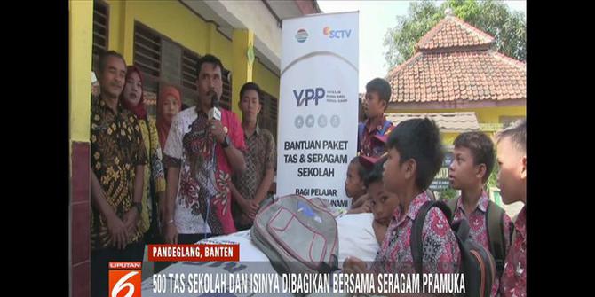 YPP SCTV-Indosiar Bagikan Peralatan Sekolah untuk Korban Tsunami Banten