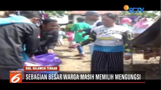 Yayasan Pundi Amal dan Peduli Kasih SCTV-Indosiar salurkan 2 ribu nasi bungkus untuk korban gempa di Palu dan Sigi, Sulawesi Tengah.