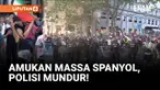 Final etape Vuelta a España 2025 ricuh setelah demonstran pro-Palestina memblokade rute balapan di Madrid, Minggu (14/9). Massa melempar barikade ke jalan dan membawa spanduk anti-Israel, memaksa para pebalap berhenti sebelum garis finis.