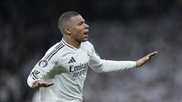 Kylian Mbappe merayakan gol untuk Real Madrid dalam laga kontra Manchester City di Liga Champions 2024/2025, Kamis (20/2/2025) dini hari WIB. (c) AP Photo/Bernat Armangue