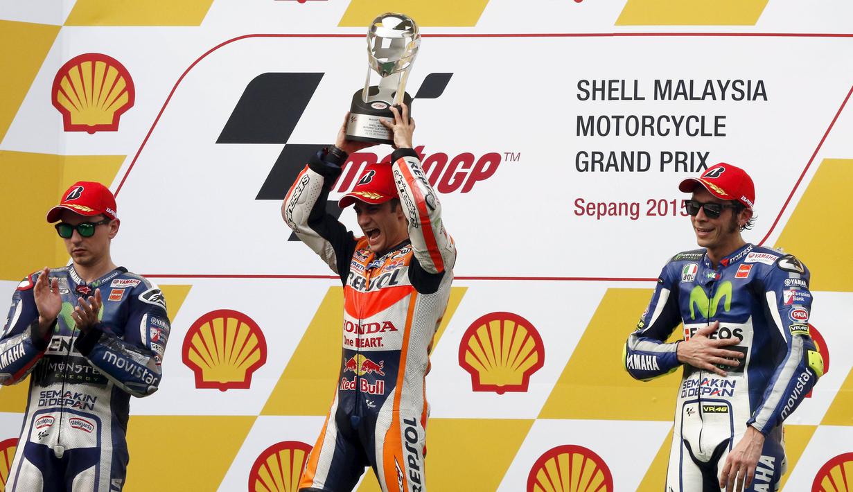 Dani Pedrosa (tengah) menjadi juara MotoGP Malaysia 2015 yang digelar di Sirkuit Sepang, Malaysia, Minggu (25/10/2015). (R/Olivia Harris)