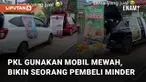 Seorang pemotor minder ketika hendak beli jajan di pinggir jalan namun PKL gunakan mobil mewah