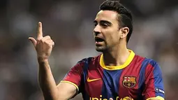 Gelandang Barcelona Xavi Hernandez pada pertemuan pertama kontra Real Madrid di babak semifinal Liga Champions pada 27 April 2011 di Santiago Bernabeu. AFP PHOTO/DANI POZO