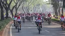 Peserta bersepeda pada acara Gowes Merdeka di BSD City, Tangerang Selatan, Minggu (18/8/2019). Gowes Merdeka yang diikuti 6.500 peserta dari Grup Astra, TNI-Polri dan komunitas sepeda digelar dalam rangka merayakan HUT ke-74 RI sekaligus mempromosikan gaya hidup sehat. (Liputan6.com/Fery Pradolo)