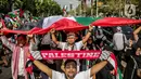 <p>Ratusan orang dari berbagai elemen masyarakat menggelar unjuk rasa di depan Kedutaan Besar Amerika Serikat, Jakarta, Sabtu (28/10/2023). Dalam aksinya, mereka mendesak Amerika Serikat dan negara-negara sekutunya untuk memastikan Israel menghentikan serangan besar-besaran di Gaza serta mengakhiri penindasan sistem Apartheid kepada warga Palestina. (Liputan6.com/Faizal Fanani)</p>