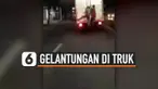 DUA REMAJA NEKAT GELANTUNGAN DI TRUK YANG MELAJU