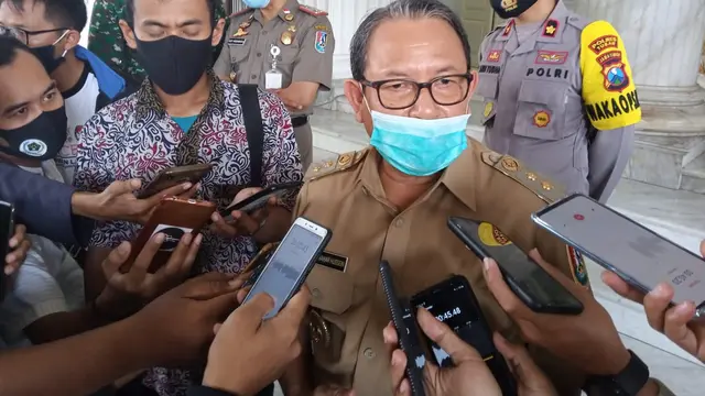 Viral Video Anggota TNI, Polisi dan Kades Joget di Konser Dangdut saat Tuban Zona Merah. (Foto: Liputan6.com/Ahmad Adirin)