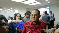 Direktur Jenderal Aplikasi dan Informatika Kemkominfo, Semuel Abrijani Pangerapan ditemui usai konferensi pers terkait pencabutan rencana pemblokiran WhatsApp di Jakarta, Rabu (8/11/2017). (Liputan6.com/Andina Librianty)