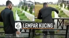 Tiba-tiba ia berjalan dan langsung melempar anak kucing itu ke parit.