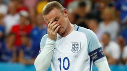 Melawan Islandia adalah penampilan ke-115 Wayne Rooney bersama timnas senior Inggris sejak tahun 2003. (Reuters/Kai Pfaffenbach) 