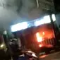 Pos Lantas Alauddin Makassar di bakar OTK (Liputan6.com/Istimewa)