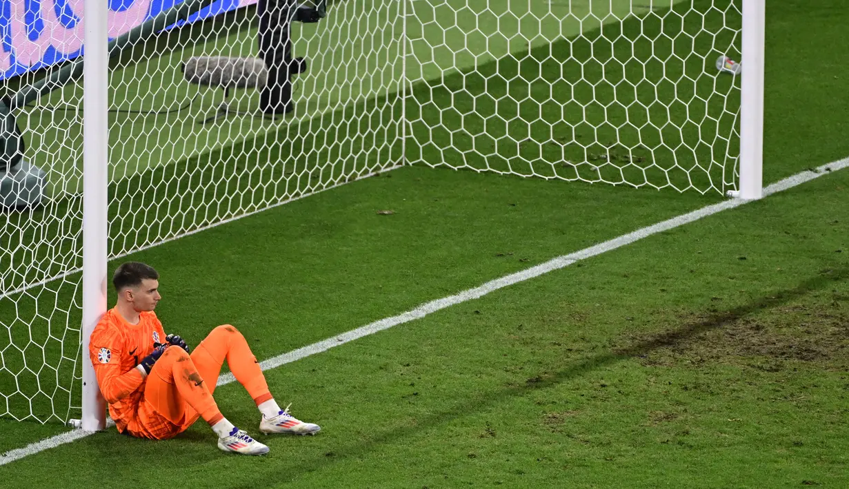 Kroasia mencetak gol lebih dahulu lewat Luka Modric, tapi Mattia Zaccagni mencetak gol telat yang selamatkan muka Italia. (JOHN MACDOUGALL / AFP)