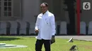 Politikus Partai Golkar Zainudin Amali tersenyum saat tiba di Istana, Jakarta, Selasa (22/10/2019). Belum diketahui posisi apa yang akan diisi oleh Zainudin dalam kementerian Kabinet Kerja Jilid II. (Liputan6.com/Angga Yuniar)