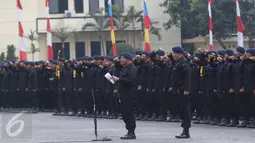 Sejumlah personel Brimob saat mengikuti apel Korps Brimob Polri di Kelapa Dua, Depok, Jumat (11/11). Dalam apel tersebut, Presiden Jokowi memberikan pengarahan sebagai Inspektur Upacara. (Liputan6.com/Immanuel Antonius)