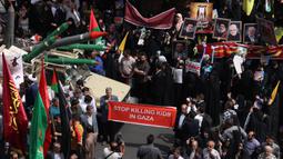 Warga Iran mengecam kembalinya operasi militer besar-besaran Israel di Jalur Gaza sejak 18 Maret 2025 lalu. (ATTA KENARE/AFP)