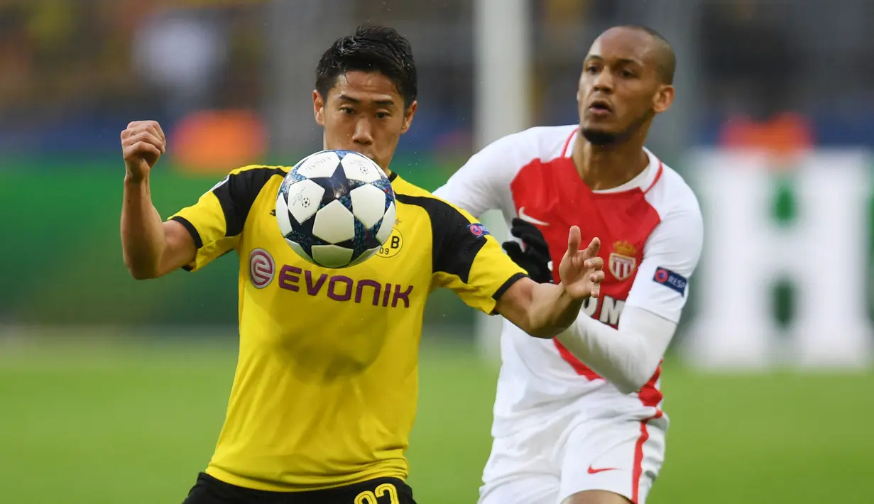 3-6. Shinji Kagawa. Gelandang asal Jepang ini telah mencetak 11 gol dalam penampilannya bersama Borussia Dortmund pada musim 2010/2011 dan 2011/2012 dan Manchester United pada musim 2012/2013 dan 2013/2014. Pada musim ini ia bermain untuk klub Yunani, PAOK Athens. (AFP/Patrik Stollarz)