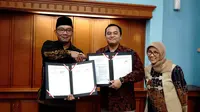 Penandatanganan kesepakatan bersama antara Pemerintah Daerah Provinsi Jawa Barat dengan Yayasan Infra Digital Nusantara tentang program CSR HUB (Liputan6.com/Jayadi Supriadin)