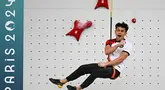 Ekspresi atlet panjat tebing Indonesia, Veddriq Leonardo setelah memenangkan final panjat tebing nomor kecepatan putra Olimpiade Paris 2024 di Le Bourget Sport Climbing Venue, Le Bourget, 8 Agustus 2024. (Fabrice COFFRINI/AFP)