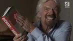 Foto Richard Branson menggunakan layanan ojek online untuk berpergian di Bali viral di media sosial.