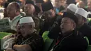 Suasana Sidang Pleno III Muktamar NU 33 yang digelar di Alun-alun Jombang, Jawa Timur, Rabu (5/8/2015). Sejumlah peserta terlihat tertidur saat mengikuti Sidang pleno III Muktamar NU 33. (Liputan6.com/Johan Tallo)