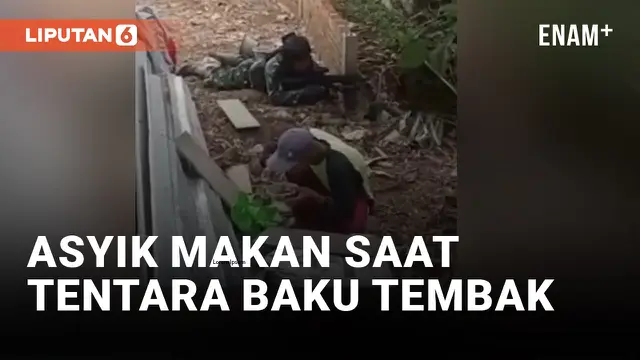 Pusing! Pria Ini Fokus Makan saat Tentara Sedang Baku Tembak