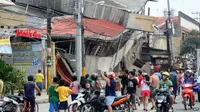 Gempa Bohol membuat orang-orang berlarian ke jalan-jalan di Cebu - salah satu kota besar di Filipina. (AFP)