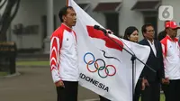 Presiden Joko Widodo atau Jokowi saat upacara pelepasan Kontingen Indonesia untuk SEA Games 2019 Filipina di Istana Bogor, Jawa Barat, Rabu (27/11/2019). Sebanyak 841 atlet Indonesia akan bertanding pada SEA Games Filipina di 51 cabang olahraga. (Liputan6.com/Angga Yuniar)