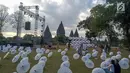 Ratusan payung terpasang selama Festival Payung Indonesia 2019 di Taman Garuda Mandala, Komplek Candi Prambanan, Kabupaten Klaten, Sabtu ( 7/9/2019). Acara ini diadakan secara tahunan dengan peserta dari beberapa provinsi di Indonesia serta dari Spanyol dan Thailand. (Liputan6.com/Gholib)