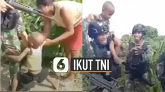 Saat digendong oleh anggota TNI, bocah ini langsung berhenti menangis.