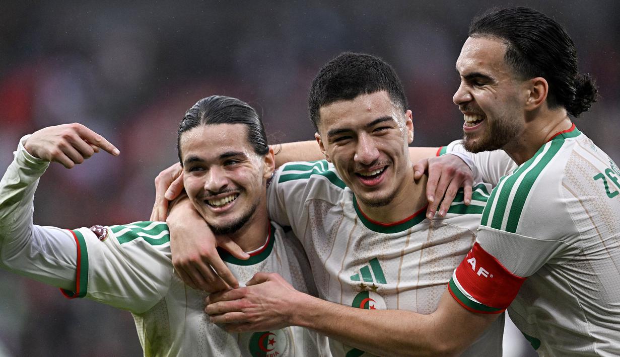 Selain itu, Aljazair juga menjadi satu-satunya tim di Piala Afrika yang berhasil menyabet tiga kemenangan beruntun pada fase grup. (AFP/Paul Ellis)