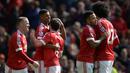 Para pemain MU merayakan gol yang dicetak Marcus Rashford ke gawang Aston Villa pada laga Liga Inggris di Stadion Old Trafford, Manchester, Sabtu (16/4/2016). MU menang 1-0 atas Aston Villa. (AFP/Oli Scarff)